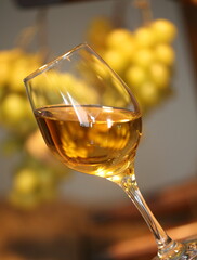 Still life with white wine and grapes