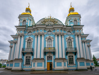 Fototapeta na wymiar St. Nicholas Church in St. Petersburg against the background of a cloudy sky