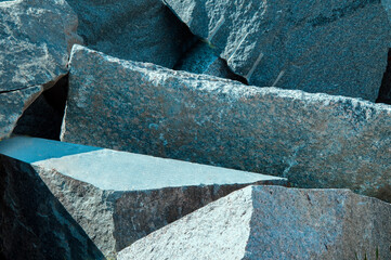 large blocks of granite rocks piled in a heap. High quality photo