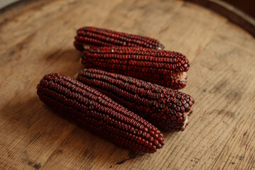 Jimmy red corn on wooden background