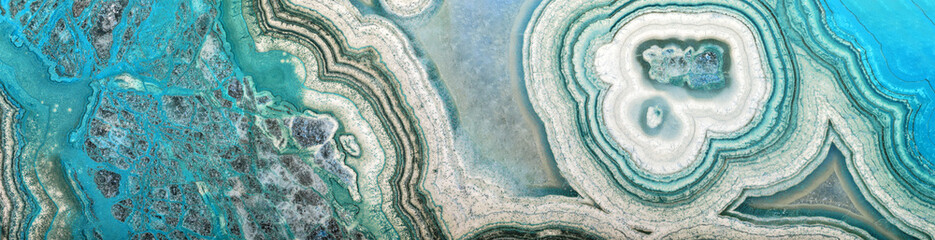 close-up of bright and dark cyan color agate stripe