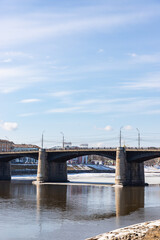 Fototapeta na wymiar New Volga bridge in spring landscape Volga river shore in Tver city