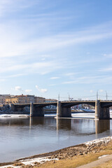 Fototapeta na wymiar New Volga bridge in spring landscape Volga river shore in Tver city