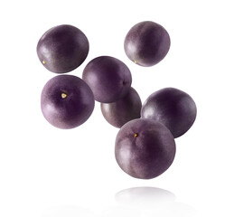 Fresh ripe passion fruit falling in the air