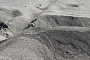 Imagen de textura con arena, figura en la playa