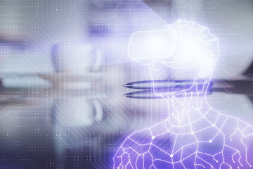 Double exposure of man in VR glasses drawing hologram over coffee cup background in office. Concept of AR