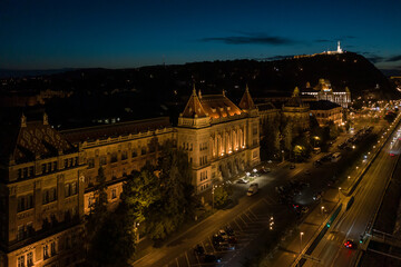 Fototapeta na wymiar Hungary - University of Technology and Economics of Budapest at night from drone view