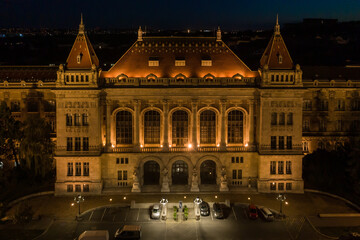 Fototapeta na wymiar Hungary - University of Technology and Economics of Budapest at night from drone view