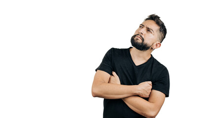man in black shirt pensive with arms crossed on white background
