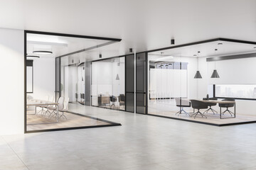 Modern glass meeting room interior with furniture, equipment, empty presentation posters and window...