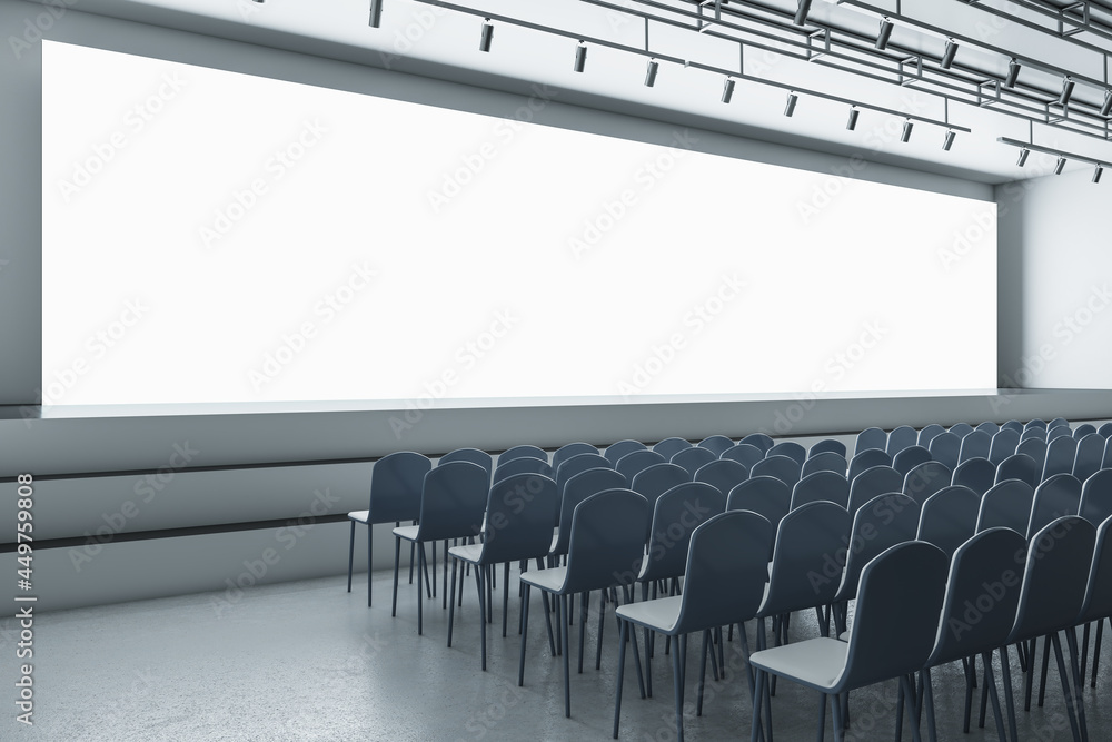 Poster Spacious grey auditorium with seating and empty screen with mock up place for your advertisement. Show premiere and entertainment concept. 3D Rendering.