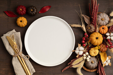 Rustic menu mockup with plate and autumn table decoration.  Floral interior decor for fall holidays...