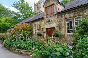 Fototapeta na wymiar beautiful 16th / 17th century cottage property in the scenic Wiltshire UK Cotswold village of Castle Combe