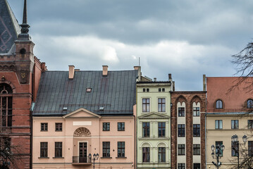 Fototapeta premium Tenement houses on the main square of historic part of Torun city, Poland