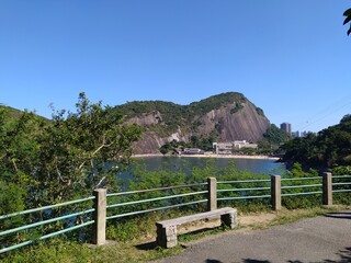 Fototapeta na wymiar Beautiful landscape with beach, trees and mountains. City of Rio de Janeiro.