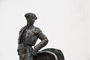 metal statue of a bullfighter