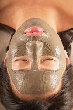 Close-up of woman with facial mask