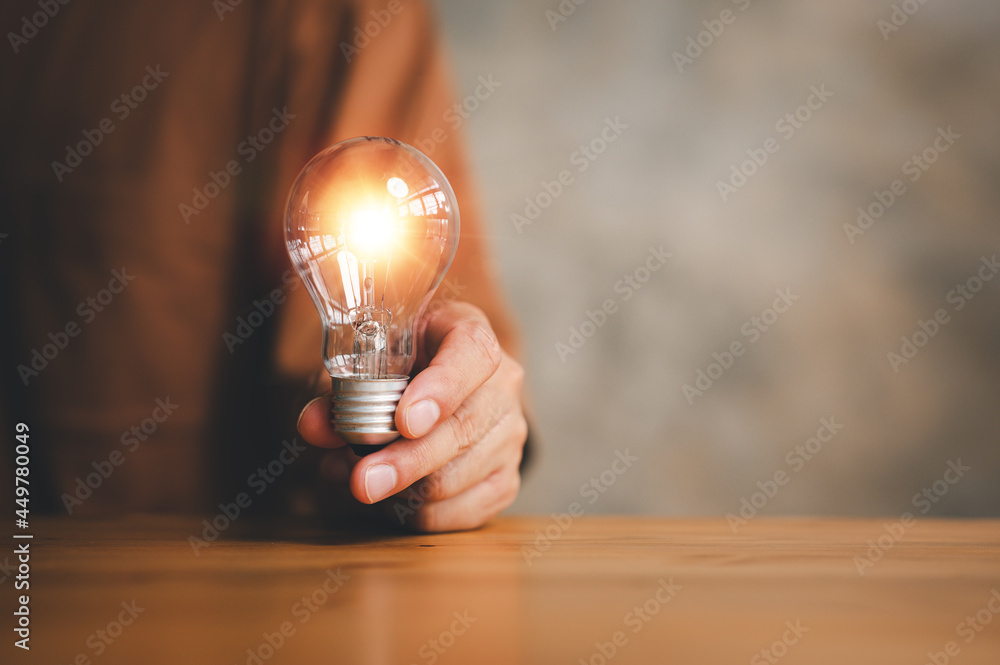 Poster innovation. hands holding light bulb for concept new idea concept with innovation and inspiration, i