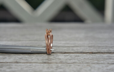 unfinished gold ring adorned with gems