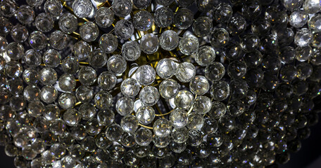 Elegant pendant lamp with many balls in a living room