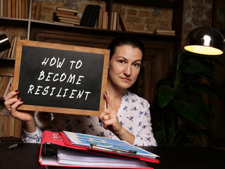 Fototapeta premium HOW TO BECOME RESILIENT phrase on the black board