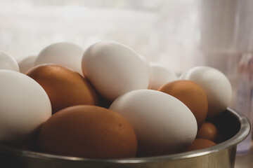 Eggs in a Bowl on a Sunny Counter Ready for Breakfast