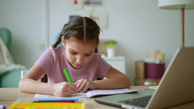 Online home school for junior children girl draws on page Spbd