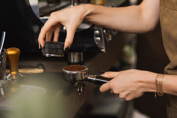 Unrecognizable Person preparing coffee filter