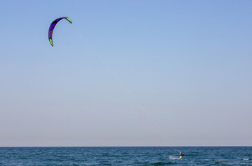 a person doing Kitesurfing on the Black Sea in Mamaia resort - Romania 30.Jul.2021