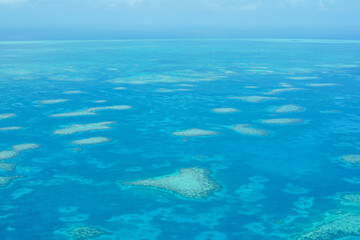 Beautiful Caribbean sea of emerald green as seen from the sky