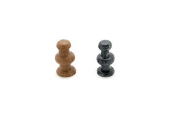 Two chess pieces white and black upright