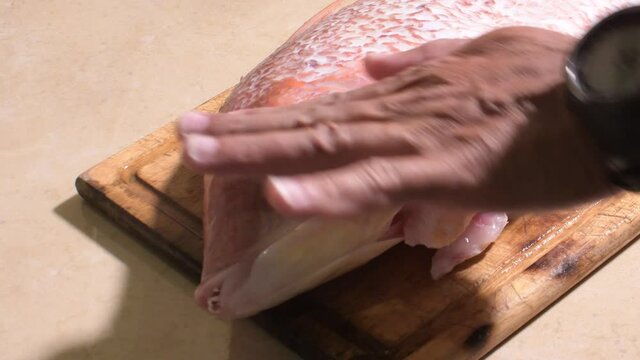 slicing rooster snapper on wheels