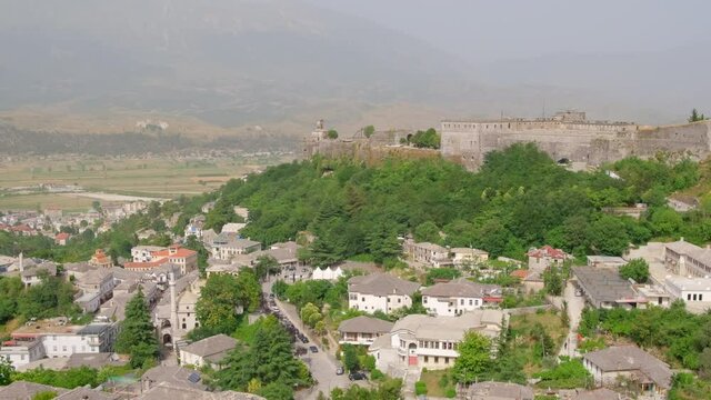 Gjirokastra cityscape in southern Albania. Old town and Gjirokaster old castle 