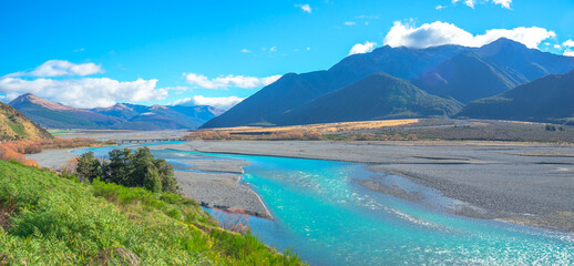 panoramic view of turquoise water of Waimakariri River passing through Arthur's Pass National Park,...