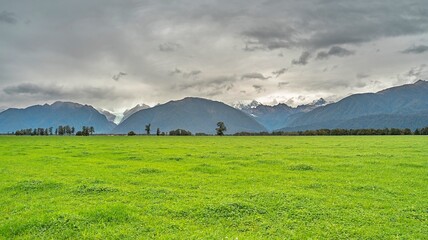 panoramic scenery of Fox Glacier from Peak View Point on cloudy day, Franz Josef Glacier in Westland Tai Poutini National Park on the West Coast of New Zealand's South Island