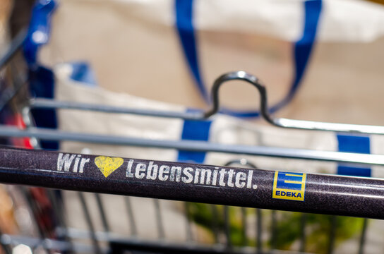Soest, Germany - August 7, 2021: Shopping trolley in EDEKA. The Edeka Group is the largest German supermarket corporation as of 2017, holding a market share of 20.3%.