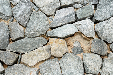 Nature stone on the ground at coast.