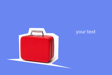 small red suitcase on colorful background. traveling concept. space for your text