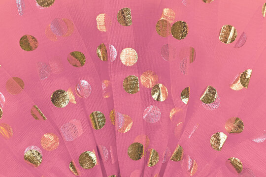 Light pinkk tulle fabric with golden and silver polka dots