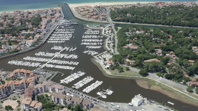 Drone Aerial views of the french harbour town Capbreton in the aquitaine region of the south of france. Capbreton, Soorts-Hossegor and Notre Dame are famous travel destinations on the atlantic coast.