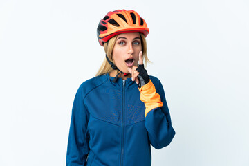 Young blonde Uruguayan cyclist woman isolated on background intending to realizes the solution while lifting a finger up