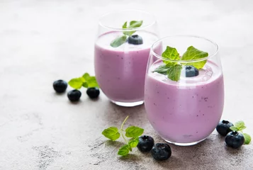 Foto op Plexiglas Glasses of blueberry yogurt with blueberries © Olena Rudo