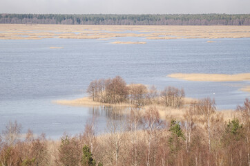 Aerial view of Kanieris lake in sunny spring day, Latvia