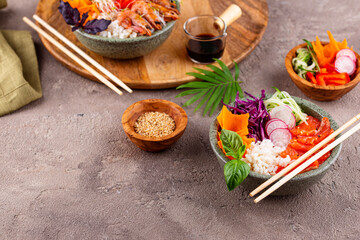 Hawaiian poke bowl with salmon and shrimps