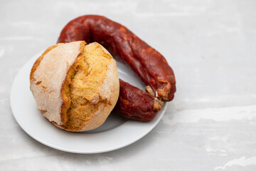 typical portuguese smoked sausage chourico with corn bread