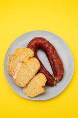 typical portuguese corn bread with smoked sausage chourico