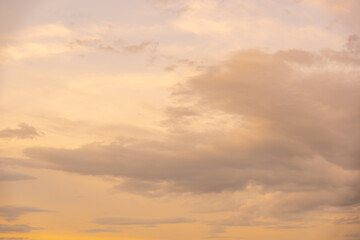 Naklejka na ściany i meble Golden sky and cloud on sunset background