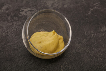 Dijon mustard sauce in the bowl
