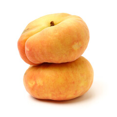 chinese flat peaches on white background 