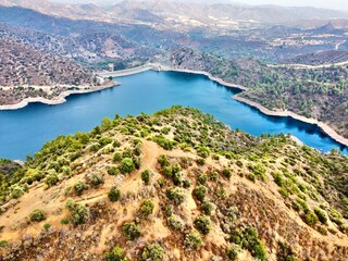 Fototapeta na wymiar Aerial bird's eye drone view of water Lefkara reservoir river lake Cyprus 